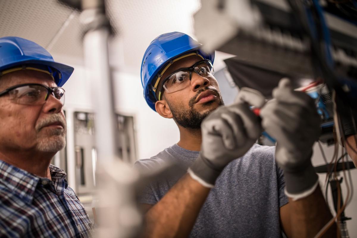 electricians-working-on-fuse-box.jpg